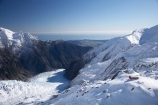 above;aerial;aerial-photo;aerial-photograph;aerial-photographs;aerial-photography;aerial-photos;aerial-view;aerial-views;aerials;Almer-Hut;alp;alpine;alps;back-country-hut;backcountry;backcountry-hut;backcountry-huts;climbers-hut;climbers-huts;cold;danger;DOC-hut;DOC-huts;Franz-Josef-Glacier;glacial;glacier;glaciers;high-altitude;high-country-hut;highcountry;highcountry-hut;highcountry-huts;hikers-hut;hikers-huts;huits;hut;ice;icy;main-divide;mount;mountain;mountain-hut;mountain-huts;mountaineers-hut;mountaineers-huts;mountainous;mountains;mountainside;mt;mt.;N.Z.;New-Zealand;NZ;outdoors;range;ranges;S.I.;SI;snow;snowy;South-Is.;South-Island;South-West-New-Zealand-World-Heritage-Area;southern-alps;Te-Poutini-National-Park;Te-Wahipounamu;trampers-hut;trampers-huts;West-Coast;Westland;westland-national-park;White;winter;World-Heritage-Area