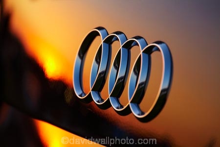 Audi;Audi-Badge;Audi-logo;Audi-Rings;automobile;automobiles;car;car-badge;cars;Chile;dusk;evening;four-rings;new;nightfall;orange;polished;reflect;reflection;reflections;shiny;sky;South-America;Sth-America;sunset;sunsets;tranportation;transport;twilight;vehicle;vehicles