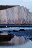 afternoon-light;bluff;bluffs;Britain;British-Isles;calm;chalk-cliff;chalk-cliffs;chalk-downland;chalk-downlands;chalk-downs;chalk-formation;chalk-formations;chalk-headland;chalk-headlands;chalk-layer;chalk-layers;cliff;cliffs;coast;coastal;coastline;coastlines;coasts;Cretaceous-chalk-layer;Cuckmere-Beach;Cuckmere-Haven;down;downland;downlands;downs;East-Sussex;England;English;English-Chanel;eroded;erosion;Europe;foreshore;formation;formations;G.B.;GB;geological;geological-formation;geological-formations;geology;Great-Britain;image;images;late-light;layer;layering;layers;limestone;low-tide;low-tides;natural;natural-landscape;natural-landscapes;ocean;oceans;photo;photos;placid;quiet;reflection;reflections;rock-formation;rock-formations;S.E.-England;SE-England;sea;Seaford;seas;sedimentary-layer;sedimentary-layers;serene;Seven-Sisters;Seven-Sisters-Chalk-Cliffs;Seven-Sisters-Cliffs;Seven-Sisters-Country-Park;shore;shoreline;shorelines;shores;smooth;South-Downs;South-Downs-N.P.;South-Downs-National-Park;South-Downs-NP;South-East-England;Southern-England;steep;still;stone;strata;stratum;Sussex;The-Seven-Sisters;tidal;tide;tides;tranquil;U.K.;UK;United-Kingdom;unusual-natural-feature;unusual-natural-features;unusual-natural-formation;unusual-natural-formations;water;white-chalk-cliff;white-chalk-cliffs;White-Cliff;white-cliffs