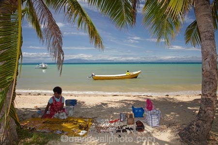 beach;beaches;boat;boats;coast;coastal;coastline;commerce;commercial;dinghies;dinghy;Fij;Fiji-Islands;Fijian;Fijian-lady;Fijian-village;Fijian-villages;indigenous;island;islands;Malolo-Is;Malolo-Island;Mamanuca-Is;Mamanuca-Islands;Mamanucas;market;market-place;market_place;marketplace;markets;Pacific;palm;palm-frond;palm-fronds;palm-tree;palm-trees;palms;people;person;retail;retailer;retailers;runabout;runabouts;sand;sandy;selling;Shell-Village;Shell-Village-trip;shop;shopping;shops;shore;shoreline;Solevu;Solevu-Village;South-Pacific;souvenir;souvenirs;stall;stalls;tourism;village;villages;woman;women