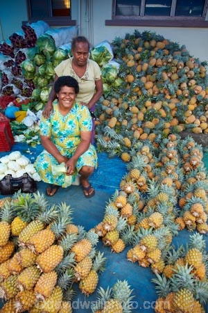 Ananas-comosus;colorful;colourful;commerce;commercial;female;Fij;Fiji-Islands;Fijian;Fijian-lady;food;food-market;food-markets;food-stall;food-stalls;fruit;fruit-and-vegetables;fruit-market;fruit-markets;lady;market;market-place;market_place;marketplace;markets;Pacific;people;person;pineapple;pineapples;produce;produce-market;produce-markets;product;products;retail;retailer;retailers;shop;shopping;shops;South-Pacific;stall;stalls;steet-scene;street-scenes;Suva;Suva-Market;Suva-Municipal-Market;Suva-Produce-Market;Viti-Levu;Viti-Levu-Island;woman