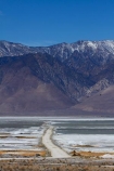alkalii-flat;America;American;barren;barreness;basin;CA;California;clay-pan;clay-pans;depression;desert;deserts;desolate;dry;dry-lake;dry-lake-bed;dry-lake-beds;dry-lakes;empty;endorheric;endorheric-basin;endorheric-basins;endorheric-lake;extreme;flat;geographic;geography;glare;glary;gravel-road;gravel-roads;Inyo-County;lake;lake-bed;lake-beds;lakes;metal-road;metal-roads;metalled-road;metalled-roads;mountain;mountain-range;mountain-ranges;mountains-range;Owens-Lake;Owens-Valley;pan;pans;playa;playas;ranges;road;roads;sabkha;saline;salt;salt-crust;salt-flat;salt-flats;salt-lake;salt-lakes;salt-pan;salt-pans;salt_pan;salt_pans;saltpan;saltpans;salty;Sierra-Nevada;Sierra-Nevada-Mountain-Range;Sierra-Nevadas;snow;snow-capped;snow_capped;snowcapped;snowy;States;Sulfate-Rd;Sulfate-Road;U.S.A;United-States;United-States-of-America;unpaved-road;unpaved-roads;USA;vast;vlei;West-Coast;West-United-States;West-US;West-USA;Western-United-States;Western-US;Western-USA;white;white-surface