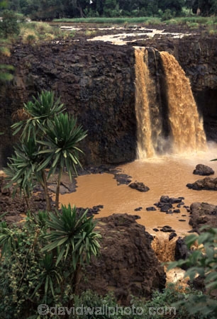 waterfall;water;fall;waterfalls;power;tumble;thunderous;africa;waterfall;waterfalls;water;natural;mist;misty;spray;high;nature;power;dirty;rainy-season;muddy;nile-river