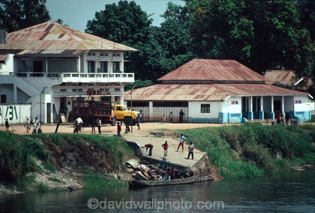 Africa;central-africa;d.-r.-congo;democratic-republic-of-congo;zaire;river;congo;bumba;shore;boat;boats;building;buildings;business;businessmen;african;trade;colony;colonial;colonisation;dock;docking;boat-dock;river-bank;riverside;river-side;men;wait;waiting;truck