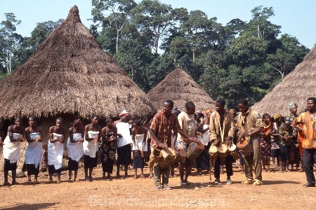 africa;african;africans;black;ethnic;male;people;person;persons;tradition;traditional;costume;costumes;traditions-costume;traditional-costumes;culture;cultural;cultures;tribe;tribes;tribal;west-africa;indigenous;native;stilts;dance;dancers;ceremony;ceremonies;sahel;zala;zaala;village;ivory-coast;west-africa;cote-divoire;drum;drums;drummer;drummers;drumming;bongo;play;music;beat;rythym;village;mud;hut;thatched;roof;singers;women;singer;performance;huts;villages