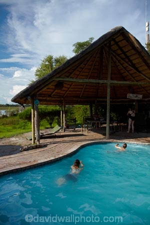 Africa;Botswana;child;children;delta;deltas;Endorheic-basin;families;family;family-holiday;family-holidays;holiday;holidays;inland-delta;internal-drainage-systems;lodge;lodges;Maun;Okavango;Okavango-Delta;Okavango-River-Lodge;Okavango-Swamp;people;person;pool;pools;river-delta;Seven-Natural-Wonders-of-Africa;Southern-Africa;swim;swimmer;swimmers;swimming-pool;swimming-pools;tourism;tourist;tourists