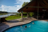 Africa;Botswana;child;children;delta;deltas;Endorheic-basin;families;family;family-holiday;family-holidays;holiday;holidays;inland-delta;internal-drainage-systems;lodge;lodges;Maun;Okavango;Okavango-Delta;Okavango-River-Lodge;Okavango-Swamp;people;person;pool;pools;river-delta;Seven-Natural-Wonders-of-Africa;Southern-Africa;swim;swimmer;swimmers;swimming-pool;swimming-pools;tourism;tourist;tourists