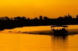 Africa;African-sunset;African-sunsets;boat;boats;Botswana;calm;Chobe-River;Chobe-Safari-Lodge;cruise;cruises;dusk;evening;Kasane;night;night_time;nightfall;orange;placid;quiet;reflected;reflection;reflections;river;rivers;Sedudu-Bar;serene;smooth;Southern-Africa;still;sundowner-cruise;sundowner-cruises;Sunset;Sunset-Bar;sunset-cruise;sunset-cruises;sunsets;tour;tour-boat;tour-boats;tourism;tourist;tourist-boat;tourist-boats;tourists;tours;tranquil;twilight;water;wildlife-cruise;wildlife-crusies