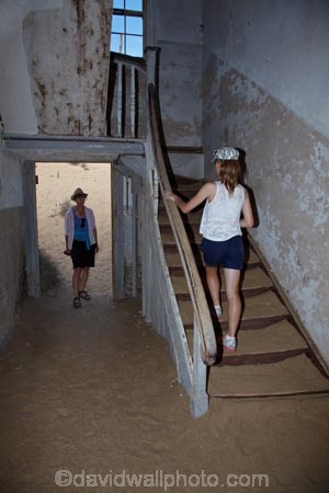 abandon;abandoned;abandoned-house;abandoned-houses;Africa;african;building;buildings;character;Colemans-hill;corridor;corridors;derelict;derelict-building;derelict-house;derelict-houses;dereliction;desert;deserted;deserts;desolate;desolation;destruction;door;doors;doorway;doorways;empty;ghost-town;ghost-towns;hall;halls;hallway;hallways;heritage;historic;historic-building;historic-buildings;Historic-Ruins;historical;historical-building;historical-buildings;history;home;homes;house;houses;Kolmannskuppe;Kolmanskop;Kolmanskop-Ghost-town;Luderitz;namib;Namib-Desert;Namibia;neglect;neglected;old;old-fashioned;old_fashioned;passage;passages;passageway;passageways;people;person;ruin;ruins;run-down;rundown;rustic;sand;sandy;Southern-Africa;Southern-Namiba;southern-Namibia;stair;stairs;stairway;stairwell;stairwells;steps;tourism;tourist;tourist-attraction;tourist-attractions;tourists;tradition;traditional;vintage;window;windows