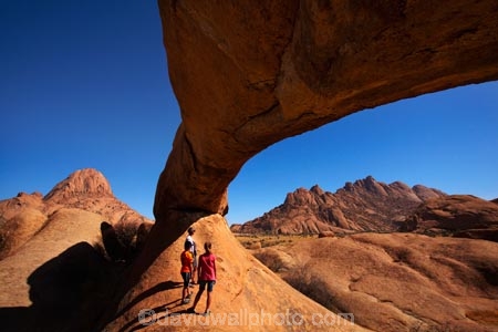 Africa;archway;archways;bald-granite-peak;bald-granite-peaks;bornhardts;boy;boys;child;children;Erongo-Region;families;family;family-holiday;family-holidays;female;geological;geology;girl;girls;Groot-Spitzkop;holiday;holidays;inselberg;inselbergs;monadnock;monadnocks;mother;Namib-Desert;Namibia;Natural-Arch;Natural-Arches;natural-bridge;natural-bridges;natural-geological-formation;natural-geological-formations;Natural-Rock-Arch;natural-rock-arches;natural-rock-archs;natural-rock-bridge;natural-rock-bridges;people;person;Pondok;Pondok-Mountain;Pondok-Mountains;Pondoks;rock;rock-arch;rock-arches;rock-formation;rock-formations;rock-outcrop;rock-outcrops;rock-tor;rock-torr;rock-torrs;rock-tors;rocks;Southern-Africa;Spitzkop;Spitzkoppe;stone;tourism;tourist;tourists;unusual-natural-feature;unusual-natural-features;unusual-natural-formation;unusual-natural-formations;wilderness;wilderness-area;wilderness-areas;woman