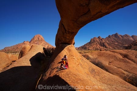 Africa;archway;archways;bald-granite-peak;bald-granite-peaks;bornhardts;boy;boys;child;children;Erongo-Region;families;family;family-holiday;family-holidays;female;geological;geology;girl;girls;Groot-Spitzkop;holiday;holidays;inselberg;inselbergs;monadnock;monadnocks;mother;Namib-Desert;Namibia;Natural-Arch;Natural-Arches;natural-bridge;natural-bridges;natural-geological-formation;natural-geological-formations;Natural-Rock-Arch;natural-rock-arches;natural-rock-archs;natural-rock-bridge;natural-rock-bridges;people;person;Pondok;Pondok-Mountain;Pondok-Mountains;Pondoks;rock;rock-arch;rock-arches;rock-formation;rock-formations;rock-outcrop;rock-outcrops;rock-tor;rock-torr;rock-torrs;rock-tors;rocks;Southern-Africa;Spitzkop;Spitzkoppe;stone;tourism;tourist;tourists;unusual-natural-feature;unusual-natural-features;unusual-natural-formation;unusual-natural-formations;wilderness;wilderness-area;wilderness-areas;woman