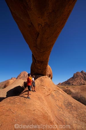 Africa;archway;archways;bald-granite-peak;bald-granite-peaks;bornhardts;boy;boys;child;children;Erongo-Region;families;family;family-holiday;family-holidays;female;geological;geology;girl;girls;Groot-Spitzkop;holiday;holidays;inselberg;inselbergs;monadnock;monadnocks;mother;Namib-Desert;Namibia;Natural-Arch;Natural-Arches;natural-bridge;natural-bridges;natural-geological-formation;natural-geological-formations;Natural-Rock-Arch;natural-rock-arches;natural-rock-archs;natural-rock-bridge;natural-rock-bridges;people;person;Pondok;Pondok-Mountain;Pondok-Mountains;Pondoks;rock;rock-arch;rock-arches;rock-formation;rock-formations;rock-outcrop;rock-outcrops;rock-tor;rock-torr;rock-torrs;rock-tors;rocks;Southern-Africa;Spitzkop;Spitzkoppe;stone;tourism;tourist;tourists;unusual-natural-feature;unusual-natural-features;unusual-natural-formation;unusual-natural-formations;wilderness;wilderness-area;wilderness-areas;woman