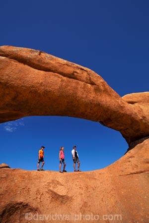 Africa;archway;archways;boy;boys;child;children;Erongo-Region;families;family;family-holiday;family-holidays;female;geological;geology;girl;girls;Groot-Spitzkop;holiday;holidays;mother;Namib-Desert;Namibia;Natural-Arch;Natural-Arches;natural-bridge;natural-bridges;natural-geological-formation;natural-geological-formations;Natural-Rock-Arch;natural-rock-arches;natural-rock-archs;natural-rock-bridge;natural-rock-bridges;people;person;rock;rock-arch;rock-arches;rock-formation;rock-formations;rock-outcrop;rock-outcrops;rock-tor;rock-torr;rock-torrs;rock-tors;rocks;Southern-Africa;Spitzkop;Spitzkoppe;stone;tourism;tourist;tourists;unusual-natural-feature;unusual-natural-features;unusual-natural-formation;unusual-natural-formations;wilderness;wilderness-area;wilderness-areas;woman