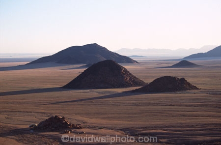 wilderness-camping;safier-farm;namib-desert;namibia;africa;camp;camping;rock;rocks;mound;mounds;hill;hills;shadow;shadows;desert;plain;plains;silhouette;silhouettes;empty;bare