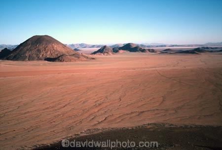 wilderness-camping;safier-farm;namib-desert;namibia;namibian;africa;african;camp;camping;camper;campers;plain;plains;rock;rocks;mound;mounds;sparse;desert;deserts;deserted;arid;empty;bare;shadow;shadows;horizon;overland;overlanding;travel;vast;empty