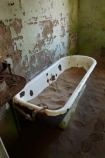 abandon;abandoned;abandoned-house;abandoned-houses;Africa;african;bath;bathroom;bathrooms;baths;bathtub;bathtubs;building;buildings;character;Colemans-hill;derelict;derelict-building;derelict-house;derelict-houses;dereliction;desert;deserted;deserts;desolate;desolation;destruction;empty;ghost-town;ghost-towns;heritage;historic;historic-building;historic-buildings;Historic-Ruins;historical;historical-building;historical-buildings;history;home;homes;house;houses;Kolmannskuppe;Kolmanskop;Kolmanskop-Ghost-town;Luderitz;namib;Namib-Desert;Namibia;neglect;neglected;old;old-fashioned;old_fashioned;ruin;ruins;run-down;rundown;rustic;sand;sandy;Southern-Africa;Southern-Namiba;southern-Namibia;tourism;tourist-attraction;tourist-attractions;tradition;traditional;tub;tubs;vintage