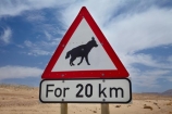 20km;Africa;B4-road;Brown-Hyena;Hyaena-brunnea;Luderitz;Namib-Desert;Namibia;Parahyaena-brunnea;road-sign;road-signs;road-warning-sign;road-warning-signs;sign;signs;Southern-Africa;Southern-Namibia;Strandjut;Strandwolf;warning-sign;warning-signs;wildlife-sign;wildlife-signs