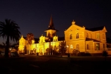 1902;Africa;architectural;architecture;Bahnhof;building;buildings;dusk;evening;floodlighting;floodlights;floodlit;heritage;historic;historic-building;historic-buildings;historical;historical-building;historical-buildings;history;Namibia;night;night_time;nightfall;old;rail-station;rail-stations;railway-station;railway-stations;Southern-Africa;Swakopmund;Swakopmund-Hotel;Swakopmund-Hotel-and-Entertainment-Centre;Swakopmund-Railway-Station;tradition;traditional;train-station;train-stations;twilight