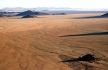 wilderness-camping;safier-farm;namib-desert;namibia;namibian;africa;african;camp;camping;camper;campers;plain;plains;rock;rocks;mound;mounds;sparse;desert;deserts;deserted;arid;empty;bare;shadow;shadows;horizon;overland;overlanding;travel;vast;empty
