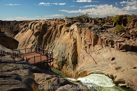 Augrabies-Falls;Augrabies-Falls-N.P.;Augrabies-Falls-National-Park;Augrabies-Falls-NP;cascade;cascades;fall;falls;gorge;gorges;national-park;national-parks;natural;nature;Northern-Cape;Northern-Cape-Province;Orange-River;people;person;platform;platforms;ravine;ravines;Republic-of-South-Africa;river;rivers;scene;scenic;South-Africa;South-African-Republic;Southern-Africa;tourism;tourist;tourists;viewing-platform;vista;water;water-fall;water-falls;waterfall;waterfalls;wet