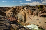 Augrabies-Falls;Augrabies-Falls-N.P.;Augrabies-Falls-National-Park;Augrabies-Falls-NP;cascade;cascades;fall;falls;gorge;gorges;national-park;national-parks;natural;nature;Northern-Cape;Northern-Cape-Province;Orange-River;people;person;platform;platforms;ravine;ravines;Republic-of-South-Africa;river;rivers;scene;scenic;South-Africa;South-African-Republic;Southern-Africa;tourism;tourist;tourists;viewing-platform;vista;water;water-fall;water-falls;waterfall;waterfalls;wet