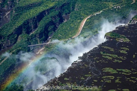 aerial;aerial-image;aerial-images;aerial-photo;aerial-photograph;aerial-photographs;aerial-photography;aerial-photos;aerial-view;aerial-views;aerials;Africa;air-craft;aircraft;aircrafts;aviating;aviation;Batoka-Gorge;Batoka-Gorges;bridge;bridges;cascade;cascades;chasm;chasms;chopper;choppers;fall;falls;First-Gorge;gorge;gorges;helicopter;helicopters;international-border;international-borders;mist;Mosi_oa_Tunya;Mosi_oa_Tunya-National-Park;natural;natural-wonders-of-the-world;nature;rain-forest;rainbow;rainbows;rainforest;ravine;ravines;river;rivers;road-bridge;road-bridges;scene;scenic;seven-natural-wonders;seven-natural-wonders-of-the-world;seven-wonders-of-the-natural-world;seven-wonders-of-the-world;Southern-Africa;spray;the-Smoke-that-Thunders;tourism;tourist-flight;tourist-flights;traffic-bridge;traffic-bridges;UN-world-heritage-area;UN-world-heritage-site;UNESCO-World-Heritage-area;UNESCO-World-Heritage-Site;united-nations-world-heritage-area;united-nations-world-heritage-site;V.F.;VF;Vic-Falls;Vic.-Falls;Victoria-Falls;Victoria-Falls-Border;Victoria-Falls-Border-Crossing;Victoria-Falls-Border-Post;Victoria-Falls-Bridge;Victoria-Falls-National-Park;water;water-fall;water-falls;waterfall;waterfalls;wet;world-heritage;world-heritage-area;world-heritage-areas;World-Heritage-Park;World-Heritage-site;World-Heritage-Sites;Zambesi;Zambesi-River;Zambeze;Zambeze-River;Zambezi;Zambezi-Gorge;Zambezi-Gorges;Zambezi-River;Zambezi-River-Gorges;Zambia;Zimbabwe;Zimbabwe-Border;Zimbabwe-Border-Crossing;Zimbabwe-Border-Post