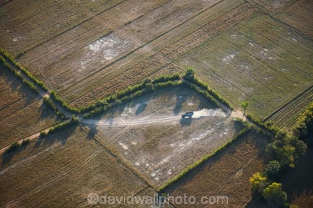 aerial;aerial-image;aerial-images;aerial-photo;aerial-photograph;aerial-photographs;aerial-photography;aerial-photos;aerial-view;aerial-views;aerials;agricultural;agriculture;Asia;Cambodia;country;countryside;dusty;farm;farm-track;farming;farmland;farms;field;fields;Indochina-Peninsula;Kampuchea;Kingdom-of-Cambodia;meadow;meadows;paddock;paddocks;pasture;pastures;road;rural;Siem-Reap;Siem-Reap-Province;Southeast-Asia;track;tracks;Truck;trucks
