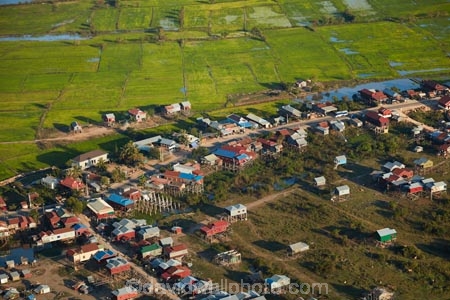 aerial;aerial-image;aerial-images;aerial-photo;aerial-photograph;aerial-photographs;aerial-photography;aerial-photos;aerial-view;aerial-views;aerials;agricultural;agriculture;Asia;Cambodia;Cambodian-village;Cambodian-villages;country;countryside;crop;crops;farm;farming;farmland;farms;field;fields;flood-plain;flood-plains;floodplain;floodplains;green;grow;horticulture;Indochina-Peninsula;Kampuchea;Kingdom-of-Cambodia;Lower-Mekong-Basin;lush;meadow;meadows;Mekong-Plain;paddock;paddocks;paddy-field;paddy-fields;pasture;pastures;Phnom-Krom;rice-field;rice-fields;rice-growing;rice-paddies;rice-paddy;rice-production;rural;Siem-Reap;Siem-Reap-Province;Southeast-Asia;stilt-house;stilt-houses;verdant