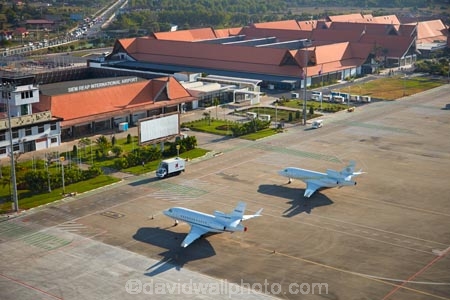 aerial;aerial-image;aerial-images;aerial-photo;aerial-photograph;aerial-photographs;aerial-photography;aerial-photos;aerial-view;aerial-views;aerials;aerodrome;aerodromes;airfield;airfields;airport;airport-terminal;airports;Asia;aviate;aviation;Cambodia;Dassault-Falcon;Dassault-Falcon-2000EX;Dassault-Falcon_900DX;Dassault-Falcons;Indochina-Peninsula;Kampuchea;Kingdom-of-Cambodia;M_TINK;N416KC;private-jet;private-jets;Siem-Reap;Siem-Reap-Airport;Siem-Reap-International-Airport;Siem-Reap-Province;Southeast-Asia;Spenaero-Dassault-Falcon;Spenaero-jet;terminal;tourism