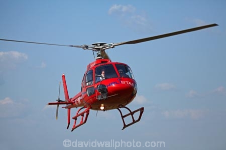 air-craft;aircraft;aircrafts;Angkor-Wat;Asia;aviating;aviation;Cambodia;chopper;choppers;Ecureuil;Eurocopter-AS350;Eurocopter-AS350B2;helicopter;helicopters;Helistar;Indochina-Peninsula;Kampuchea;Kingdom-of-Cambodia;red;Siem-Reap;Siem-Reap-Province;Southeast-Asia;tourism;tourist-flight;tourist-flights