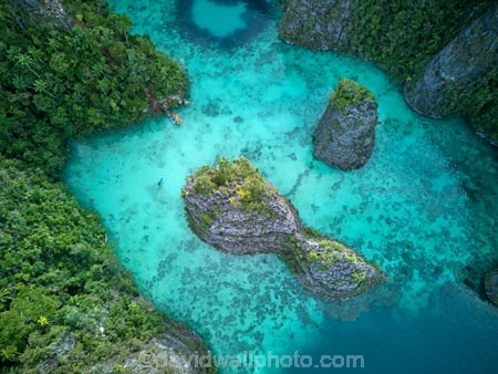 Indonesia;aerial;aerial-photo;aerial-photograph;aerial-photographs;aerial-photography;aerial-photos;aerial-view;aerial-views;aerials;drone-aerial;drone;Misool;Raja-Ampat;West-Papua;Southwest-Papua;Misool-Is;Misool-Island;karst-landscape;limestone-karsts;karst;karsts;limestone;topography;landscape;landscapes;outer-archipelago;archipelago;island;islands;outer-archipelago;archipelago;Misool-archipelago;Coral-reef;aqua;aquamarine;blue;clean-water;clear-water;coast;cobalt-blue;cobalt-ultramarine;cobaltultramarine;coral;coral-reefs;corals;reef;reefs;teal-blue;tropical-island;tropical-islands;tropical-reef;tropical-reefs;turquoise;Balbulol-Islands;Christmas-tree-lagoon;Balbulol-lagoon;lagoon;lagoons;Balbulol;paradise;tourism;travel
