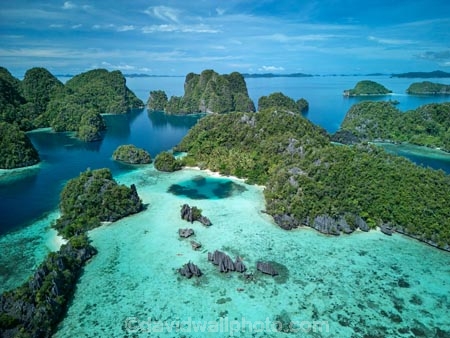 Namlol;Namlol-Lagoon;Namlol-Island;Reef;Coral-reef;coral;coral-reefs;corals;reef;reefs;aqua;aquamarine;blue;clean-water;clear-water;coast;cobalt-blue;cobalt-ultramarine;cobalt;ultramarine;teal-blue;tropical-island;tropical-islands;tropical-reef;tropical-reefs;turquoise;karst-landscape;limestone-karsts;karst;karsts;limestone;topography;landscape;landscapes;island;islands;karst-formations;karst-formation;Indonesia;aerial;aerial-photo;aerial-photograph;aerial-photographs;aerial-photography;aerial-photos;aerial-view;aerial-views;aerials;drone-aerial;drone;Misool;Raja-Ampat;West-Papua;Southwest-Papua;Misool-Is;Misool-Island;karst-landscape;landscape;landscapes;island;islands;outer-archipelago;archipelago;Misool-archipelago;paradise;tourism;travel