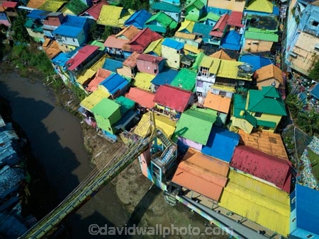 Indonesia;aerial;aerial-photo;aerial-photograph;aerial-photographs;aerial-photography;aerial-photos;aerial-view;aerial-views;aerials;drone-aerial;drone;Malang;Java;East-Java;Indonesia;Brantas-River;Roof;roofs;rooves;Kampung-Warna-Warni;Kampung;Warna-Warni;Kampung-Warna_Warni;Warna_Warni;bridge;bridges;pedestrian-bridge;pedestrian-bridges;tourism;travel;Asia;South-East-Asia;Southeast-Asia