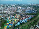 Indonesia;aerial;aerial-photo;aerial-photograph;aerial-photographs;aerial-photography;aerial-photos;aerial-view;aerial-views;aerials;drone-aerial;drone;Malang;Java;East-Java;Indonesia;Brantas-River;Roof;roofs;rooves;Kampung-Warna-Warni;Kampung;Warna-Warni;Kampung-Warna_Warni;Warna_Warni;Kampung-Tridi;Tridi;Kampung-Biru-Arema;Biru-Arema;Blue-Village;The-Blue-Village;tourism;travel;Asia;South-East-Asia;Southeast-Asia