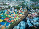 Indonesia;aerial;aerial-photo;aerial-photograph;aerial-photographs;aerial-photography;aerial-photos;aerial-view;aerial-views;aerials;drone-aerial;drone;Malang;Java;East-Java;Indonesia;Brantas-River;Roof;roofs;rooves;Kampung-Warna-Warni;Kampung;Warna-Warni;Kampung-Warna_Warni;Warna_Warni;Kampung-Tridi;Tridi;Kampung-Biru-Arema;Biru-Arema;Blue-Village;The-Blue-Village;bridge;bridges;pedestrian-bridge;pedestrian-bridges;road-bridge;road-bridges;traffic-bridge;traffic-bridges;tourism;travel;Asia;South-East-Asia;Southeast-Asia