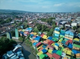 Indonesia;aerial;aerial-photo;aerial-photograph;aerial-photographs;aerial-photography;aerial-photos;aerial-view;aerial-views;aerials;drone-aerial;drone;Malang;Java;East-Java;Indonesia;Brantas-River;Roof;roofs;rooves;Kampung-Warna-Warni;Kampung;Warna-Warni;Kampung-Warna_Warni;Warna_Warni;Kampung-Tridi;Tridi;railway-bridge;rail-bridge;tourism;travel;Asia;South-East-Asia;Southeast-Asia