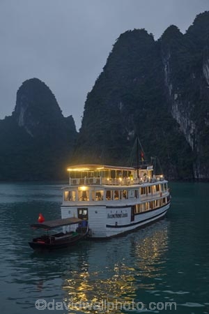 Asia;boat;boats;calm;cruise-boat;cruise-boats;cruising;dusk;evening;Ha-Long-Bay;Halong-Bay;Halong-Phoenix-Boat;Halong-Phoenix-Cruiser-Boat;Halong-Phoenix-Cruiser-Tour-Boat;karst-landscape;light;lighting;lights;limestone-karsts;night;nightfall;North-Vietnam;Northern-Vietnam;placid;Qung-Ninh-Province;Quang-Ninh-Province;quiet;reflected;reflection;reflections;serene;smooth;South-East-Asia;Southeast-Asia;still;tour-boat;tour-boats;tourism;tourist;tourist-boat;tourist-boats;tourists;tranquil;travel-destination;UN-world-heritage-area;UN-world-heritage-site;UNESCO-World-Heritage-area;UNESCO-World-Heritage-Site;united-nations-world-heritage-area;united-nations-world-heritage-site;Vnh-H-Long;Vietnam;Vietnamese;water;world-heritage;world-heritage-area;world-heritage-areas;World-Heritage-Park;World-Heritage-site;World-Heritage-Sites