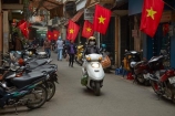 Asia;Asian;bike;bikes;female;flag;flags;Hanoi;Hanoi-Old-Quarter;motorbike;motorbikes;motorcycle;motorcycles;motorscooter;motorscooters;Old-Quarter;people;person;red-flag;red-flags;scooter;scooters;South-East-Asia;Southeast-Asia;step_through;step_throughs;street;street-scene;street-scenes;streets;Vietnam;Vietnam-Flag;Vietnam-Flags;Vietnamese;Vietnamese-Flag;Vietnamese-Flags;woman;women