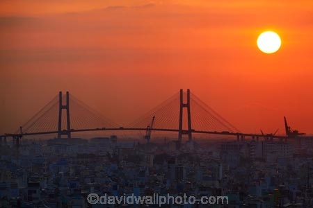Asia;Asian;break-of-day;bridge;bridges;cable_stayed-bridge;cable_stayed-bridges;cable_stayed-road-bridge;cable_stayed-road-bridges;cities;city;dawn;dawning;daybreak;first-light;H.C.M.-City;H-Chí-Minh;HCM;HCM-City;Ho-Chi-Minh;Ho-Chi-Minh-City;infrastructure;morning;orange;Phu-My-Bridge;Phú-M-Bridge;road-bridge;road-bridges;Saigon;South-East-Asia;Southeast-Asia;sunrise;sunrises;sunup;suspension-bridge;suspension-bridges;traffic-bridge;traffic-bridges;transport;twilight;Vietnam;Vietnamese