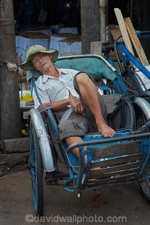 Asian;barrow;barrows;cart;carts;commerce;commercial;Dong-Ba-Market;hand-cart;Hu;Hue;market;market-place;market-stall;market-stalls;market_place;marketplace;marketplaces;markets;nap;North-Central-Coast;people;person;retail;retailer;retailers;rickshaw;rickshaws;shop;shopping;shops;sleep;sleeping;snooze;stall;stalls;street-scene;street-scenes;Tha-ThiÃªn_Hu-Province;Thua-Thien_Hue-Province;Vietnam;Vietnamese;wheel-barrow;Asia