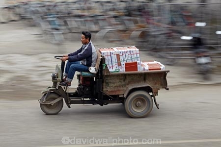 Asia;bike;bikes;blur;blurred;blurry;man;men;Ninh-Binh;Ninh-BÃ¬nh-province;Ninh-Hai;Northern-Vietnam;South-East-Asia;Southeast-Asia;speed-blur;street;street-scene;street-scenes;streets;trike;trikes;Van-Lam-Village;Vietnam;Vietnamese