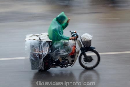 Asia;bike;bikes;blur;blurred;blurry;motorbike;motorbikes;motorcycle;motorcycles;motorscooter;motorscooters;Ninh-Binh;Ninh-BÃ¬nh-province;Ninh-Hai;Northern-Vietnam;rain;raining;scooter;scooters;South-East-Asia;Southeast-Asia;speed-blur;step_through;step_throughs;street;street-scene;street-scenes;streets;Van-Lam-Village;Vietnam;Vietnamese;wet