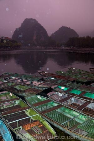 Asia;boat;boat-harbors;boat-harbour;boats;dark;dock;docks;dusk;evening;karst-topography;karsts;limestone-karst;limestone-karsts;limestone-landscape;Ngo-Dong-River;night;night-time;night_time;Ninh-Binh;Ninh-BÃ¬nh-province;Ninh-Hai;Northern-Vietnam;punt;punts;rain;raining;rainy;Red-River-Delta;river;rivers;row-boat;row-boats;South-East-Asia;Southeast-Asia;Tam-Coc;Tan-Coc;Three-Caves;tourism;tourist;tourist-boat;tourist-boats;tourists;UN-world-heritage-area;UN-world-heritage-site;UNESCO-World-Heritage-area;UNESCO-World-Heritage-Site;united-nations-world-heritage-area;united-nations-world-heritage-site;Van-Lam-Village;Vietnam;Vietnamese;water;world-heritage;world-heritage-area;world-heritage-areas;World-Heritage-Park;World-Heritage-site;World-Heritage-Sites