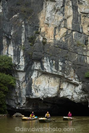 Asia;Asian;boat;boat-shop;boats;cave;caves;cliff;cliffs;floating-shop;floating-shops;hawker;hawkers;karst-topography;karsts;limestone-cave;limestone-caves;limestone-karst;limestone-karsts;limestone-landscape;Ngo-Dong-River;Ninh-Binh;Ninh-BÃ¬nh-province;Ninh-Hai;Northern-Vietnam;people;person;punt;punts;Red-River-Delta;river;rivers;row-boat;row-boats;seller;shop;shops;South-East-Asia;Southeast-Asia;Tam-Coc;Tan-Coc;Three-Caves;tourism;tourist;tourist-boat;tourist-boats;tourists;Trang-An-Lanscape-Complex;Trang-An-World-Heritage-Site;UN-world-heritage-area;UN-world-heritage-site;UNESCO-World-Heritage-area;UNESCO-World-Heritage-Site;united-nations-world-heritage-area;united-nations-world-heritage-site;Van-Lam-Village;Vietnam;Vietnamese;water;world-heritage;world-heritage-area;world-heritage-areas;World-Heritage-Park;World-Heritage-site;World-Heritage-Sites