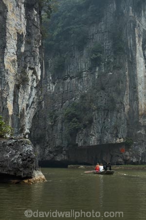 Asia;Asian;boat;boats;cave;caves;cliff;cliffs;karst-topography;karsts;limestone-cave;limestone-caves;limestone-karst;limestone-karsts;limestone-landscape;Ngo-Dong-River;Ninh-Binh;Ninh-BÃ¬nh-province;Ninh-Hai;Northern-Vietnam;people;person;punt;punts;Red-River-Delta;river;rivers;row-boat;row-boats;South-East-Asia;Southeast-Asia;Tam-Coc;Tan-Coc;Three-Caves;tourism;tourist;tourist-boat;tourist-boats;tourists;Trang-An-Lanscape-Complex;Trang-An-World-Heritage-Site;UN-world-heritage-area;UN-world-heritage-site;UNESCO-World-Heritage-area;UNESCO-World-Heritage-Site;united-nations-world-heritage-area;united-nations-world-heritage-site;Van-Lam-Village;Vietnam;Vietnamese;water;world-heritage;world-heritage-area;world-heritage-areas;World-Heritage-Park;World-Heritage-site;World-Heritage-Sites