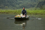 Asia;boat;boat-shop;boats;floating-shop;floating-shops;hawker;hawkers;karsts;limestone-karst;limestone-karsts;limestone-landscape;Ngo-Dong-River;Ninh-Binh;Ninh-Bình-province;Ninh-Hai;Northern-Vietnam;people;person;punt;punts;Red-River-Delta;river;rivers;row-boat;row-boats;seller;shop;shops;South-East-Asia;Southeast-Asia;Tam-Coc;Tan-Coc;Three-Caves;tourism;tourist;tourist-boat;tourist-boats;tourists;Trang-An-Lanscape-Complex;Trang-An-World-Heritage-Site;UN-world-heritage-area;UN-world-heritage-site;UNESCO-World-Heritage-area;UNESCO-World-Heritage-Site;united-nations-world-heritage-area;united-nations-world-heritage-site;Van-Lam-Village;Vietnam;Vietnamese;water;world-heritage;world-heritage-area;world-heritage-areas;World-Heritage-Park;World-Heritage-site;World-Heritage-Sites