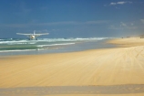 aeroplane;aeroplanes;airplane;airplanes;australasia;Australia;australian;beach;beaches;coast;coastal;coastline;coastlines;fly;flying;Fraser-Island;golden-sand;great-sandy-n.p.;great-sandy-national-park;great-sandy-np;islands;passenger-plane;plane;planes;queensland;sand;sandy;seventy-five-mile-beach;shore;shoreline;shorelines;UN-world-heritage-site;united-nations-world-heritage-s;world-heritage;World-Heritage-site;yellow-sand