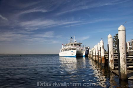 Australasia;Australia;bollard;bollards;calm;City-of-Shoalhaven;coast;coastal;coastline;coastlines;coasts;Dolphin-Watching-Boat;foreshore;Huskisson;Jervis-Bay;jetties;jetty;moored;N.S.W.;New-South-Wales;NSW;ocean;pier;piers;piles;placid;quiet;reflection;reflections;sea;serene;Shoalhaven;shore;shoreline;shorelines;shores;smooth;South-New-South-Wales;Southern-New-South-Wales;still;The-Shoalhaven;tranquil;water;waterside;Whale-Watching-Boat;wharf;wharfes;wharves