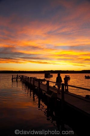Australasia;Australia;boat;boats;calm;City-of-Shoalhaven;dusk;estuaries;estuary;evening;inlet;inlets;jetties;jetty;lagoon;lagoons;lake;lakes;N.S.W.;New-South-Wales;nightfall;NSW;orange;people;person;pier;piers;placid;quiet;reflection;reflections;Saint-Georges-Basin;Saint-Georges-Basin;serene;Shoalhaven;silhouette;silhouettes;sky;smooth;South-New-South-Wales;Southern-New-South-Wales;St-Georges-Basin;St-Georges-Basin;St.-Georges-Basin;St.-Georges-Basin;still;sunset;sunsets;The-Shoalhaven;tidal;tide;tranquil;twilight;water;waterside;wharf;wharfes;wharves