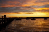 Australasia;Australia;boat;boats;calm;City-of-Shoalhaven;dusk;estuaries;estuary;evening;inlet;inlets;jetties;jetty;lagoon;lagoons;lake;lakes;N.S.W.;New-South-Wales;nightfall;NSW;orange;people;person;pier;piers;placid;quiet;reflection;reflections;Saint-Georges-Basin;Saint-Georges-Basin;serene;Shoalhaven;silhouette;silhouettes;sky;smooth;South-New-South-Wales;Southern-New-South-Wales;St-Georges-Basin;St-Georges-Basin;St.-Georges-Basin;St.-Georges-Basin;still;sunset;sunsets;The-Shoalhaven;tidal;tide;tranquil;twilight;water;waterside;wharf;wharfes;wharves